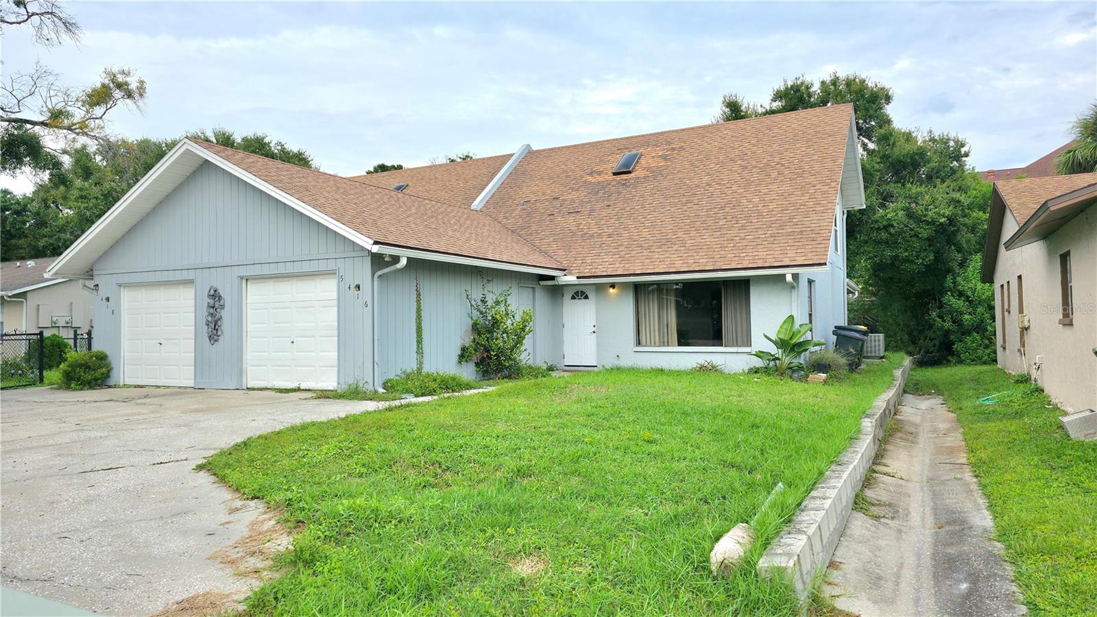 Two-story duplex unit offering 3 bedrooms and 2 bathrooms with a practical layout. The main level includes an open living and dining area with access to a private screened backyard. All bedrooms are located upstairs, providing privacy and separation from the main living space. Convenient Sarasota location close to University Parkway, shopping, dining, and a short drive to local beaches.