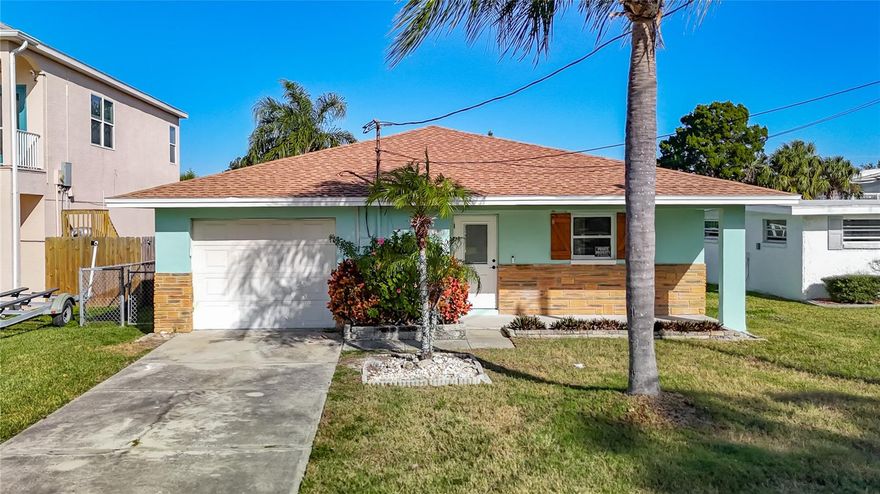 Short Sale. Wake up to serene water views in this beautifully renovated 2-bedroom, 2-bath waterfront home that blends modern comfort with relaxed coastal living. Completely updated from top to bottom, the home features an open-concept layout, stylish finishes, and abundant natural light throughout. The modern kitchen flows seamlessly into the living and dining areas, perfect for everyday living or entertaining. Both bedrooms are generously sized, with updated bathrooms. Step outside to enjoy peaceful water views and direct gulf access, ideal for morning coffee, sunset evenings, or weekend relaxation. This move-in-ready waterfront retreat offers the perfect balance of style, comfort, and location.