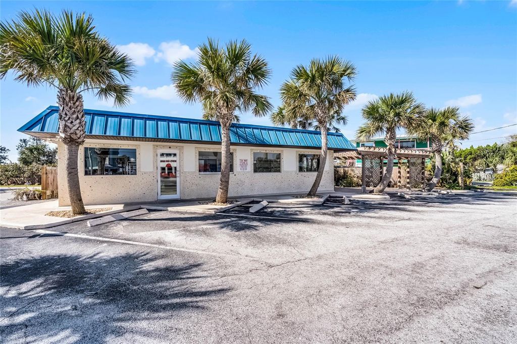 Photo of 819 A1a, New Smyrna Beach, FL 32169 (MLS # NS1084195)