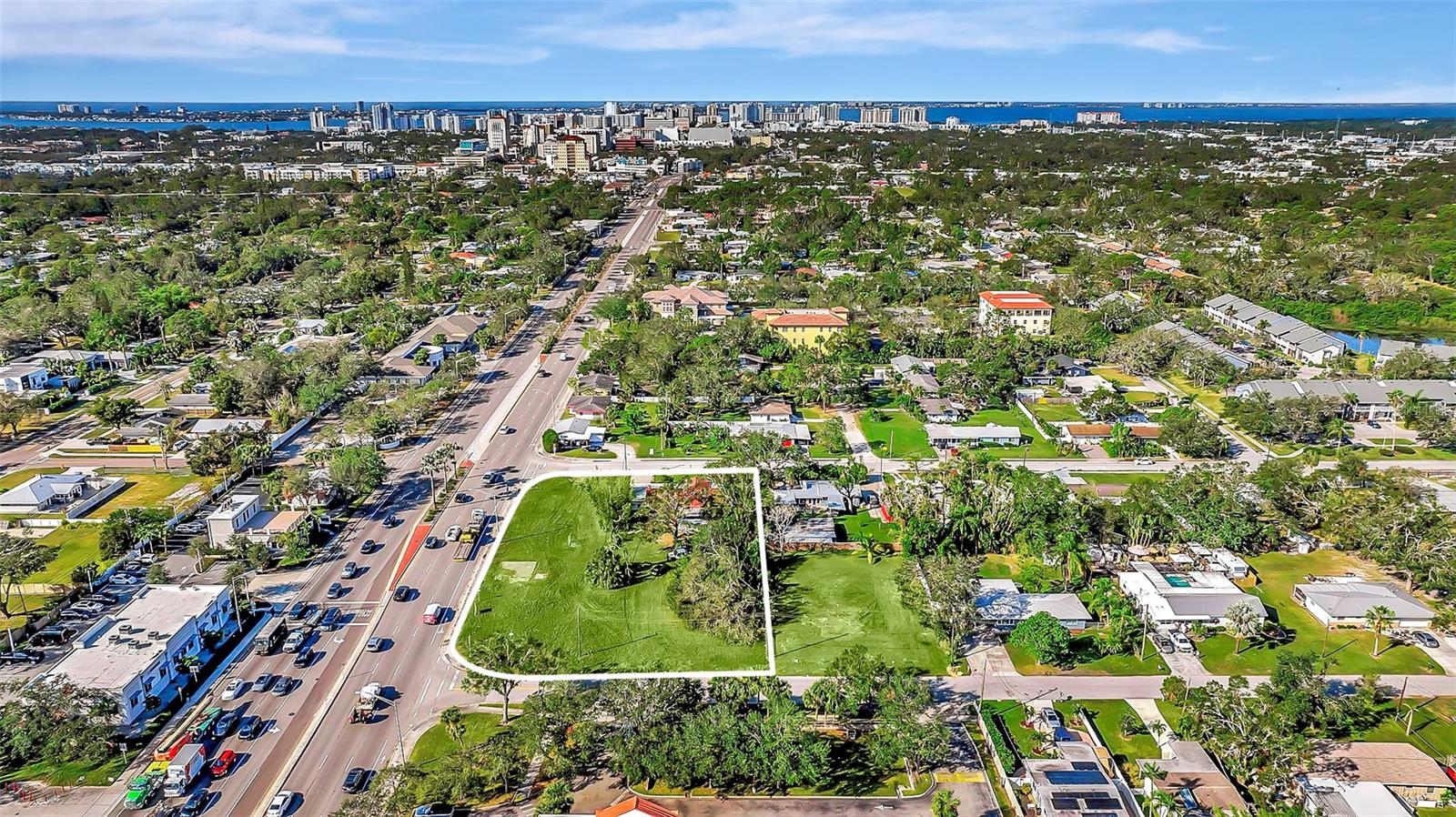 What will soon be 2701 Fruitville Rd, after you buy it. Sarasota City passed earlier in the year, up to 75 units/acre, high density residential. Endless commercial applications as well. 270' of frontage, 150' deep, 3 access points, 50000 cars a day, a perfect rectangle. Very few properties of this scale with the correct future land use pencil out these days, this one does. Inquire with listing agent about those density bonuses if you prefer multifamily development. The cherry on top, this property includes a 3/2 single family home, roughly 20k gross annual income back to your pocket while you wait for standard approval process'. Want more? The seller would consider holding paper for well qualified buyers.
