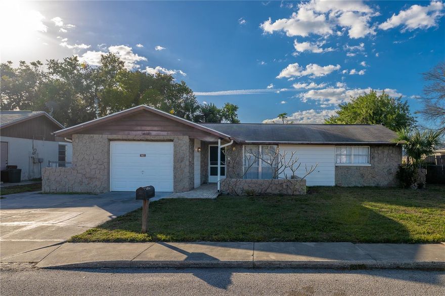 This well-situated Port Richey home offers a rare combination of immediate livability and long-term upside, making it ideal for both owner-occupants and investors alike. This home offers solid structural elements and opportunities to add your personal touch, making it ideal for buyers looking to customize and add value. The home features a recently replaced HVAC system (2020), providing comfort and peace of mind as you update the interior to reflect your style and preferences.

Step inside to discover a livable interior with excellent renovation potential, perfect for creative design ideas and modernization. Whether you’re envisioning refreshed living spaces, updated finishes, or an open-concept floor plan, this home provides a strong foundation for your vision.

Enjoy outdoor living in the spacious fenced backyard, complete with a built-in fireplace, ideal for gatherings, weekend barbecues, or relaxing evenings under the stars. The fenced yard also offers privacy and a safe environment for pets and family.

Location is a standout, just one block from U.S. 19, offering easy access to shopping, dining, services, and commuter routes. Everything you need is within reach, blending convenience with small-town Florida living.

Don’t miss this opportunity to make this Port Richey property your own. Bring your ideas, invest in updates, and reap the rewards in a highly accessible and convenient neighborhood.