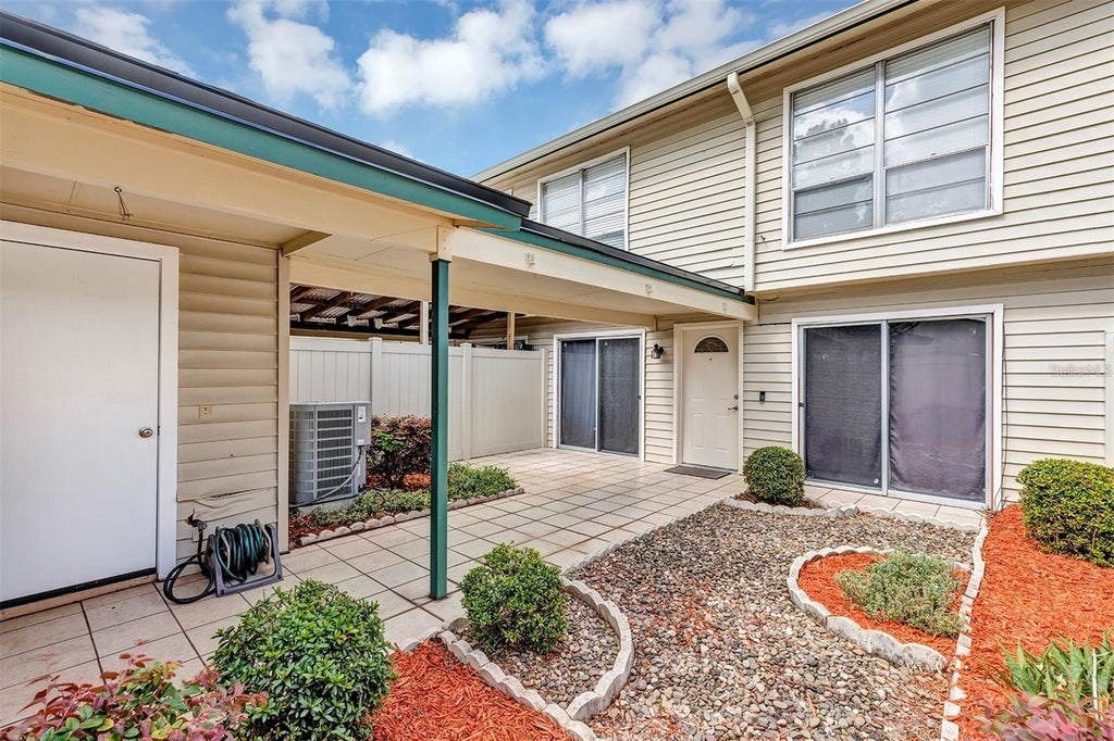 Photo of 1728 Townhall Lane #1728, Orlando, FL 32807 (MLS # O6444708)