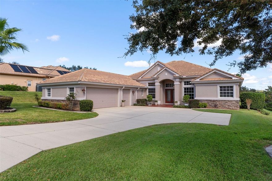 3-Car Garage | 3 Bedrooms | 2 Bathrooms | Steps from BellaVita Spa & Fitness Center Enjoy resort-style living in this beautifully updated Foxfire home in the sought-after Terra Vista community. Located along the popular Fenway-Skyview Crossing walking and fitness trail and just moments from the BellaVita Spa & Fitness Center—where many residents start and end their day—this nearly 3,000 sq. ft. home offers exceptional access to Terra Vista’s premier amenities. Foxfire is a highly desirable single-entrance neighborhood where homes rarely become available. This move-in-ready home features an open floor plan with abundant natural light, soaring 10- and 12-foot ceilings, formal living and dining rooms, a spacious family room, and a large office. The oversized 3-car garage accommodates two vehicles, a golf cart, and workshop space, complete with built-in cabinetry, countertops, and a garage refrigerator. The spacious primary suite opens to the covered lanai through updated French doors. The remodeled bath features granite countertops, vessel sinks, a Jacuzzi tub, and a large walk-in shower. The updated kitchen offers GE Profile appliances, a breakfast bar, casual dining area, and overlooks the family room, making it ideal for everyday living and entertaining. Situated on an elevated lot approximately 131 feet above sea level, the home enjoys beautiful hill views and desirable eastern exposure. Residents enjoy golf, pickleball, tennis, fitness centers, resort-style pools, dining, live entertainment, social clubs, and community events, with shopping, healthcare, and everyday conveniences just minutes away. A rare opportunity to own a well-maintained, updated home in one of Terra Vista’s most desirable neighborhoods.