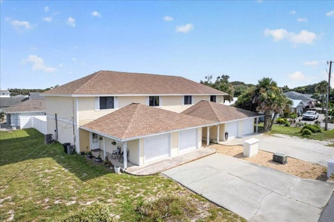 Photo of 841 E 14th Avenue, New Smyrna Beach, FL 32169 (MLS # S5158432)