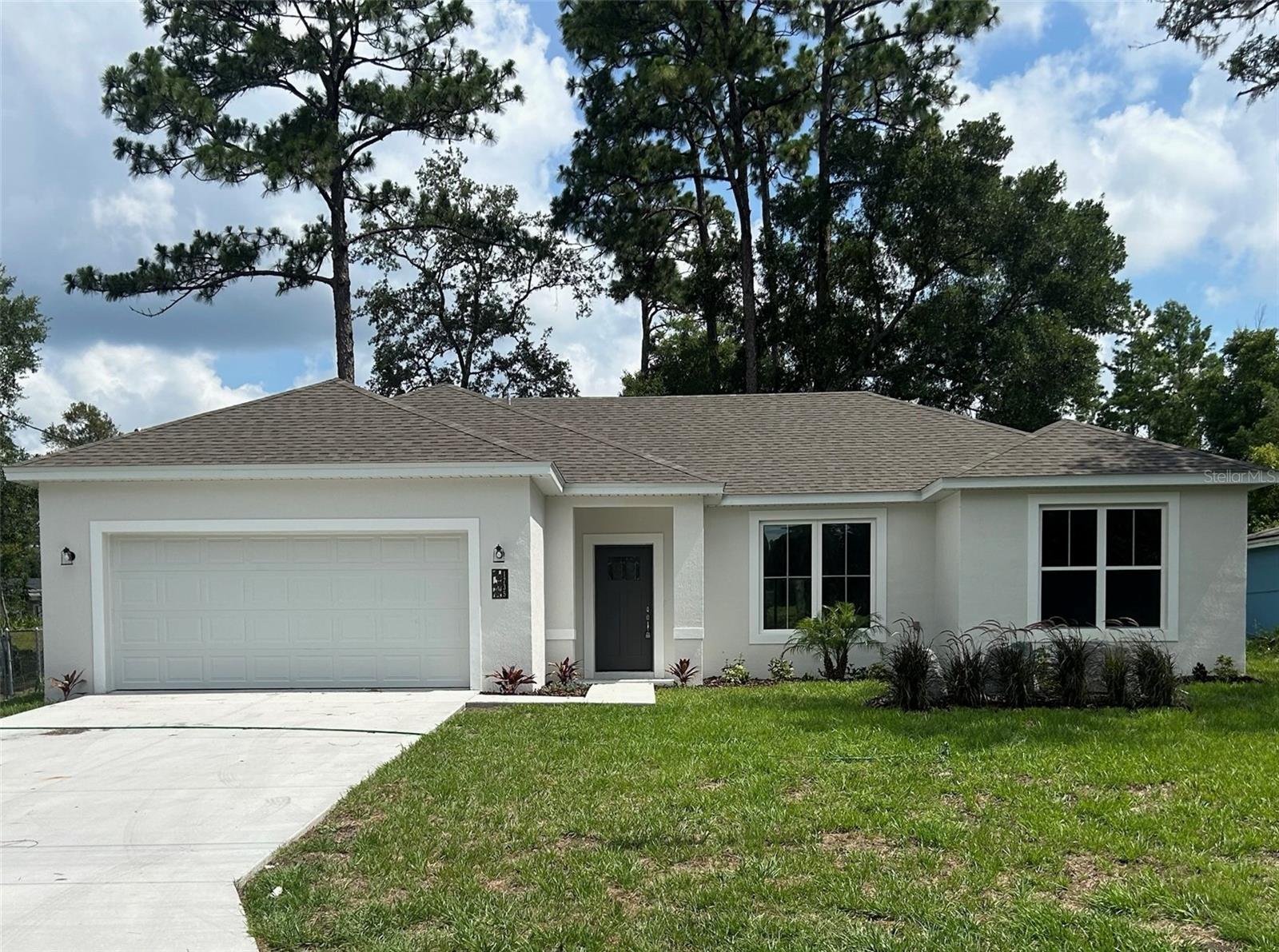 Under Construction. SELLER MOTIVATED!! NOW is YOUR time!! NEW BUILD!! This beautiful new home is located in a quiet neighborhood with no HOA fees! Perfectly nestled on a quiet street, you'll be wanting to call this 1,530 square foot, 3/2 split floor plan "Home Sweet Home!" The main living area is open to the kitchen and boasts soaring ceilings that provide a spacious, open feel. The gorgeous kitchen includes stainless-steel appliances, 42” cabinets and a granite-topped island. The Owner’s Suite features a large walk-in closet and the private bathroom includes a step-in shower with custom tile and a large corner soaking tub. Additional features include ceiling fans in all bedrooms and living area. Don’t miss this incredible opportunity! SCHEDULE A SHOWING TODAY!