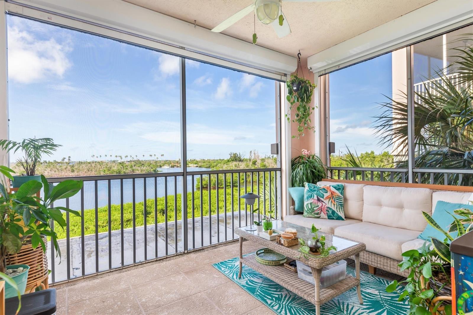 Coastal luxury meets everyday convenience at Boca Vista Harbor. This rare end-unit condo is perfectly positioned to capture sweeping views of Coral Creek, Gasparilla Sound, and the Intracoastal, all just minutes from Boca Grande’s pristine beaches, shops, and dining. Featuring 3 bedrooms and 2 bathrooms, this residence blends modern updates with resort-style amenities. Inside, you’ll find driftwood luxury vinyl flooring throughout, fresh interior paint, updated 5.5” baseboards, new LED lighting and ceiling fans. Enjoy lots of natural light with three additional windows that this end unit offers. The re-designed kitchen offers a spacious, open layout with a new LG stainless steel appliance package. The primary suite is a peaceful retreat with stunning water views, 2 large walk-in closets, and an en-suite bath featuring dual vanities and a walk-in shower. Outdoors, the screened lanai,with hurricane shades is ideal for morning coffee or evening sunsets, and all windows and sliders are hurricane impact rated for peace of mind. A private 1-car garage with new opener adds convenience. Recent exterior updates include a new roof, new stucco siding, refinished pool and spa, and refreshed tropical landscaping. Boca Vista Harbor amenities include a gated entrance, heated pool and spa with poolside grills, tennis and pickleball court, kayak and paddleboard launch area, and direct access to a full-service marina with boat slips available when offered. This condo is ideal as a primary residence, vacation retreat, or lucrative rental, with minimum 3-day rentals permitted. Water, sewer, and trash are included in the HOA fee. Start living the Boca lifestyle—schedule your private showing today!