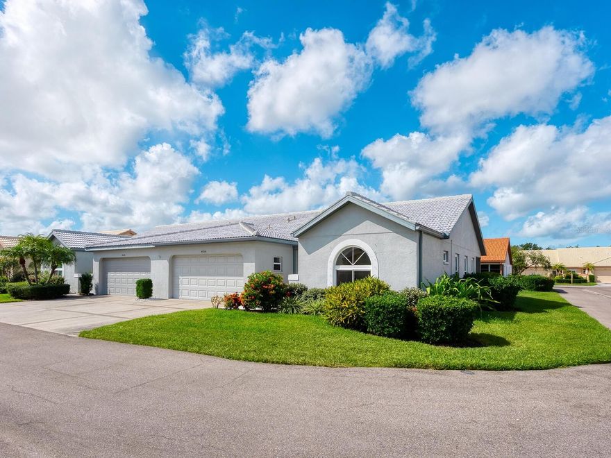 Filled with natural light and thoughtfully updated throughout, this beautifully maintained 2-bedroom, 2-bath villa with a den/office offers the perfect blend of comfort, efficiency, and style. With no northern neighbor, the home enjoys exceptional sunlight and privacy. Step inside to discover an open floor plan enhanced by vaulted ceilings and wood plank tile flooring that flows seamlessly throughout. The renovated kitchen is a showstopper, featuring brand new wifi enabled LG appliances, including an induction hub range, granite countertops, stylish backsplash and ample cabinetry for storage. The primary suite is a true retreat, boasting two walk-in closets, bay windows, and a renovated bath with  Grohe fixtures and ultra-clear glass shower enclosure. Guests will appreciate the updated second bathroom, designed with the same attention to quality and detail. An indoor laundry room adds everyday convenience with a full-sized washer and dryer, a utility sink, and additional storage space, keeping chores organized and efficient. Notable upgrades include new windows, a variable speed 2-step HVAC system with wifi controlled thermostat and humidistat for optimal comfort and remote accessibility, LED lighting throughout, a new electrical panel, thermal wifi controlled garage door, and Nest Wi-Fi smoke detectors. The enclosed lanai, complete with wood protection panels, provides a peaceful spot to unwind year-round. Enjoy all this within a partially gated community offering resort-style amenities, including a clubhouse, recreation room, pool, tennis courts, and shuffleboard. Conveniently located near top-rated restaurants, shopping centers, grocery stores, and medical facilities, this villa delivers both lifestyle and location.
Move right in and start living your best Florida life!