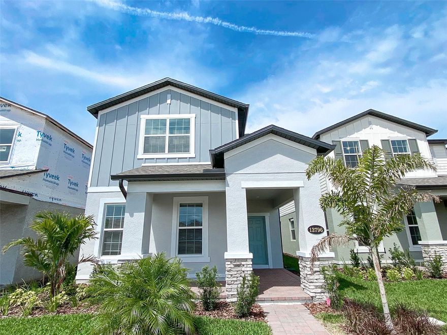 Gorgeous 4-bedroom, 3.5-bathroom single-family home located in the sought-after Encore at Ovation Community in Winter Garden. This house offers a spacious and contemporary gourmet kitchen with a large center island and stainless steel appliances. Gas community! There's a convenient guest bedroom suite downstairs, while the master bedroom, two additional bedrooms, and a generous loft are situated upstairs. The master bedroom includes "his" and "hers" walk-in closets and an en-suite bathroom with a double vanity. The home comes with a 2-car garage and includes a washer and dryer. The community provides access to a pool, gym, playground, and numerous walking trails. Situated just a few miles away from various amenities, including Publix, Walmart, hospitals, restaurants, and shopping options. With ongoing development in the vicinity, more conveniences are being added. The location is near the major interchange of 429 and Western, right outside Disney West, ensuring quick and easy access.