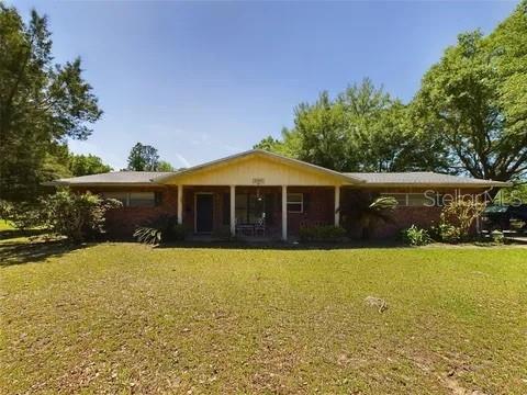 7440 SW?83rd Place, Ocala – 2.16 acres in Green Turf Acres:
Discover comfort and country charm positioned minutes from Ocala’s essential services. This well-maintained 3 bed, 2 bath single-level home offers 1,634?sq?ft of living space, a new roof (Oct 2023), and an inviting split-bedroom layout. The third bedroom enjoys its own exterior entrance—ideal for a home office or private guest suite. Inside, enjoy tile floors, ceiling fans throughout, and generous living areas. Outside, expansive grounds feature fruit trees, grapevines, and mature oaks. A spacious 2-car attached garage and utility hook-ups add convenience. This home combines acreage with accessibility.