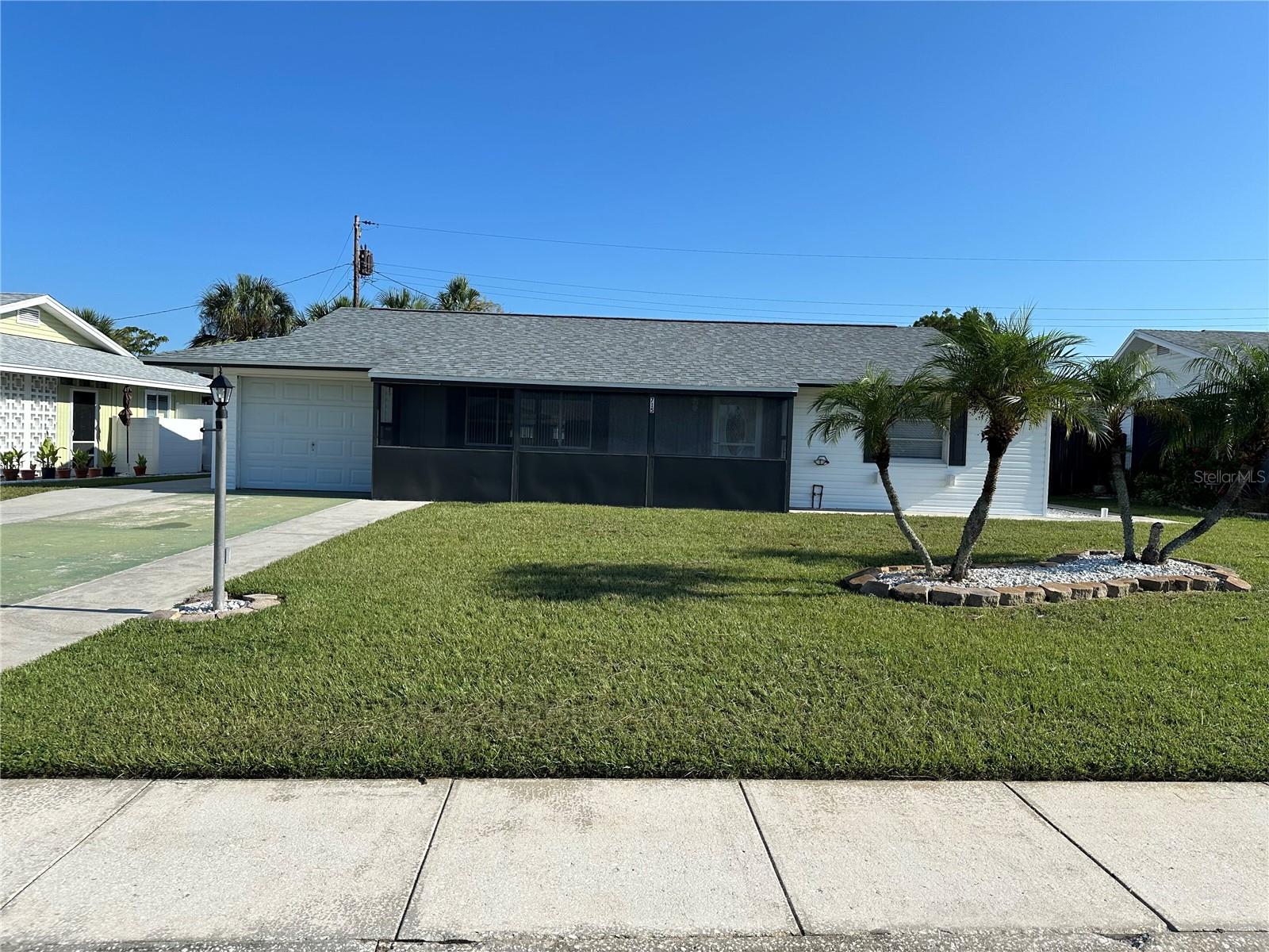 Welcome to this beautifully updated home located in the heart of Sun City Center. Situated on a quiet street, this TURN KEY meticulously maintained property offers modern upgrades, thoughtful features, and true move-in readiness. Step inside and immediately notice the clean, contemporary feel with the popcorn ceilings professionally removed and bright, natural light flooding the space. The kitchen is a standout, boasting solid wood cabinets, stainless steel appliances, additional lighting, and plenty of counter space—perfect for cooking or entertaining. Key home updates include a brand-new roof (2025), a 2021 A/C system, and a replaced sewer line (2014)—major improvements already taken care of for your peace of mind as well as a water softener already installed. Outside, a wrap-around sidewalk encircles the entire house, offering easy access and a charming touch. Functional upgrades like gutters help protect the exterior, while the dedicated golf cart garage and storage room, complete with its own garage door, provide ample space for all your tools, toys, or hobbies. This is a great seasonal home opportunity, the seller is willing to sell the furniture as-is and including the golf cart if desired. Located in one of Florida’s most vibrant 55+ communities, you’ll have access to over 200 clubs and activities, multiple clubhouses, swimming pools, and endless opportunities for connection and recreation. Don’t miss this opportunity to own a truly move-in-ready home in a dynamic and welcoming neighborhood. Schedule your private tour today and experience the charm, comfort, and convenience of life at 715 Desert Hills Way.