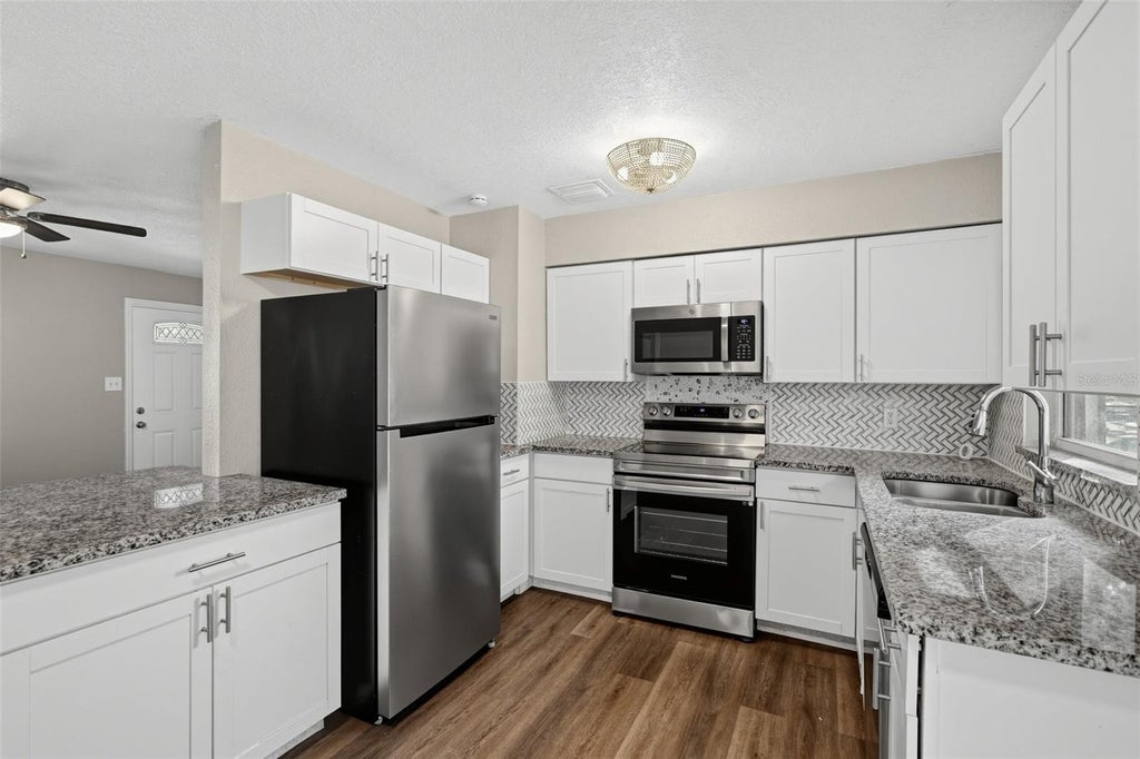 Photo of 4750 Goldsboro Court, Orlando, FL 32811 (MLS # O6451783)