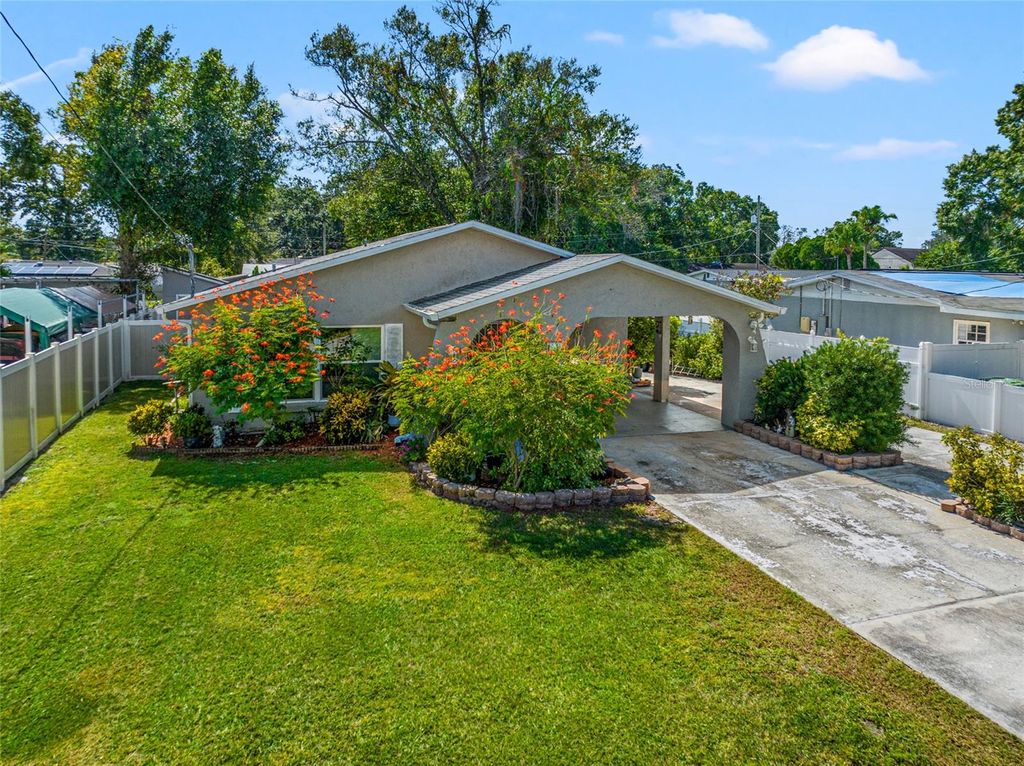 Photo of 1730 W Powhatan Avenue, Tampa, FL 33603 (MLS # T3482589)