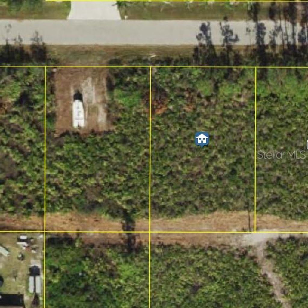 Photo of 12149 Terkelsen Avenue, Port Charlotte, FL 33981 (MLS # C7511680)