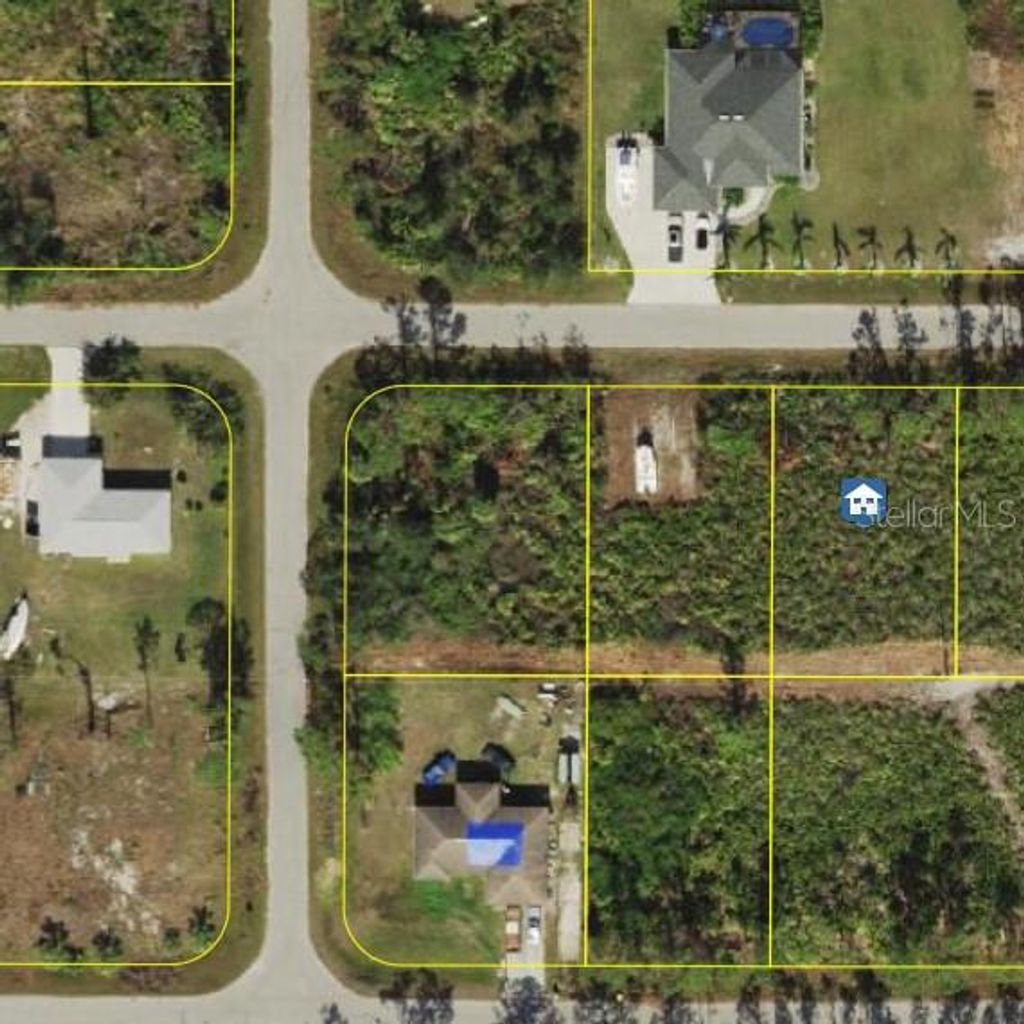 Photo of 12149 Terkelsen Avenue, Port Charlotte, FL 33981 (MLS # C7511680)