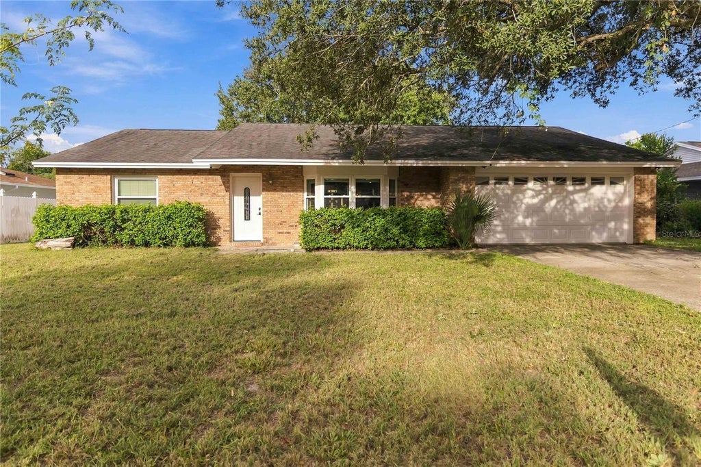 Photo of 550 Murphy Avenue, Deltona, FL 32725 (MLS # O6445823)