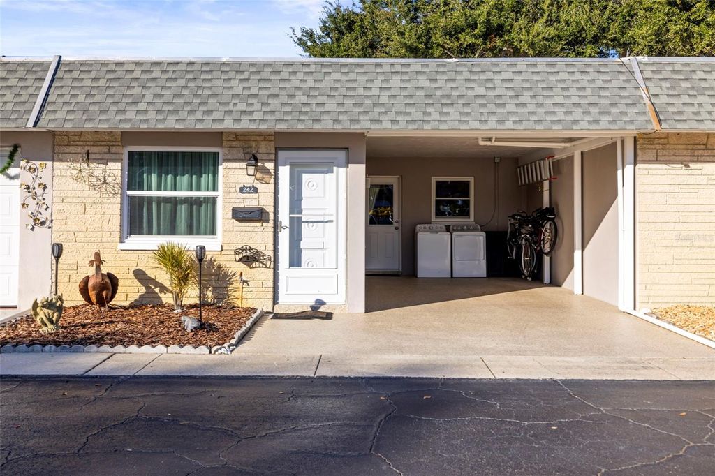 Photo of 242 Sky Loch Drive E, Dunedin, FL 34698 (MLS # TB8459972)