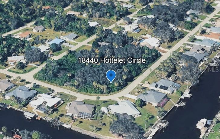 Photo of 18440 Hottelet Circle, Port Charlotte, FL 33948 (MLS # C7528726)