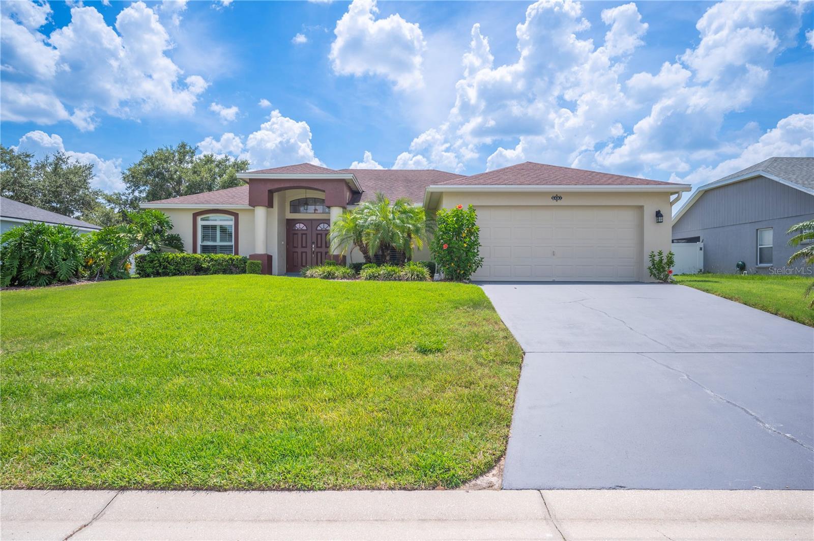 Beautiful 3 bedroom, 2 bath home in the desirable Oakford Estates! This spacious home features vaulted ceilings, a remodeled kitchen with granite countertops and plenty of cabinet space, and a large master suite with a walk-in closet. The layout is designed for ease of movement, with wide doorways and open spaces that allow for wheelchair access throughout the entire home. Bathrooms include grab bars in the shower and near the toilet, offering added safety and convenience. Major updates include a new A/C system in 2019, water heater replaced in 2022, and a roof installed in 2017, providing peace of mind for years to come. The backyard is fully fenced, perfect for pets and family gatherings and includes electrical wiring already in place for an above-ground pool. An attached 2 car garage adds convenience, and the home is ideally located near schools, shopping, and with easy access to Lakeland Highlands Road. Don’t miss this fantastic opportunity to own a comfortable, move-in ready home in a quiet neighborhood with low HOA fees.