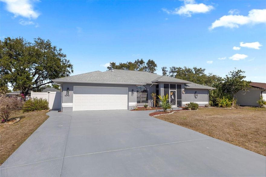 Price below market value. Welcome to this well-maintained 3-bedroom, 2-bath home offering 1,844 sq. ft. of living space on an almost quarter-acre lot in North Port. With no HOA and no CDD, this property provides flexibility and freedom in a desirable residential setting. Inside, vaulted ceilings create an open and airy feel, complemented by a herringbone-tiled foyer and thoughtful updates throughout. The kitchen features newer appliances and flows seamlessly into the main living areas, making the layout ideal for everyday living and entertaining. Both the living room and primary bedroom offer pocket sliding doors leading to the enclosed, oversized lanai/Florida room, providing additional year-round living space. The primary suite includes an updated double vanity and ample closet space. Major improvements add peace of mind, including a roof (2021), AC system (2022), and garage door (2022). Enjoy outdoor living in the landscaped backyard, fully enclosed with a newer privacy fence (2022) and featuring a children’s swing set. Conveniently located near shopping, dining, and local amenities, this home offers comfort, space, and recent updates in a non-deed-restricted neighborhood.