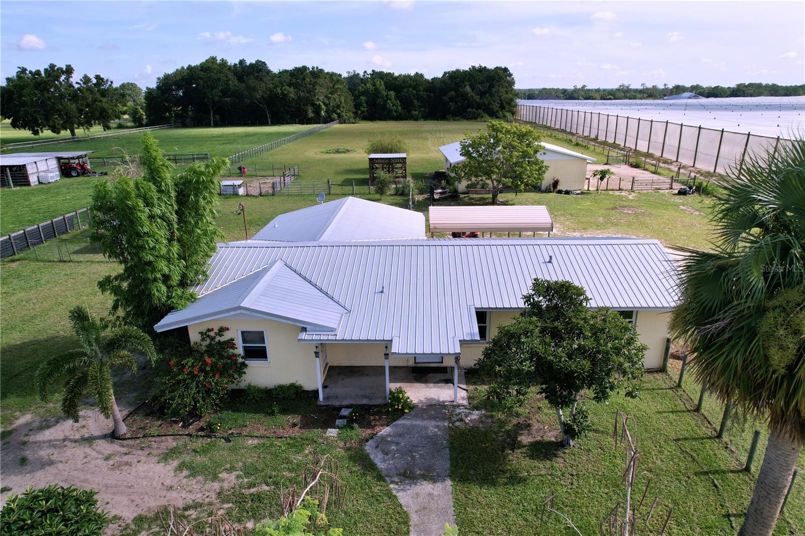 Welcome to 1711 Estes Road – where country living meets modern convenience. Nestled on 2.46 fully fenced acres, this unique property has served as a small farm for the current owners, who have raised a variety of animals in a thoughtfully designed and well-maintained environment.
The land is sectioned into multiple animal caretaking areas, providing flexibility and functionality for a variety of livestock or hobby farm setups. A solid block barn with multiple stalls offers ample shelter and storage, making it ideal for equestrian use, 4-H projects, or expanding your farmstead vision.
Enjoy the peace and privacy of country living with no HOA restrictions and the potential to benefit from agricultural classification. Wildlife is abundant in the surrounding area, making this property perfect for nature lovers and animal enthusiasts alike.
The septic and drain field were updated just prior to the current owners’ purchase, offering peace of mind and updated infrastructure.
Whether you’re looking to start a farm, expand your homestead, or simply enjoy the open space and freedom of rural living, 1711 Estes Road offers an exceptional opportunity in a beautiful and private setting.