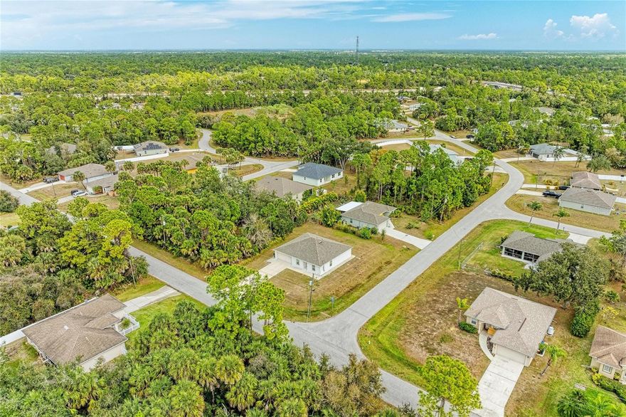 Welcome home to your TURN KEY FURNISHED 2000sqft UNDER ROOF SPACIOUS HOME placed on OVERSIZED CORNER LOT, 2022 BLOCK BUILT with plenty of room for your pool 3 Bedrooms with two more rooms that can be converted to bedrooms or his and her offices whatever fits your lifestyle, 2-bathrooms ensuring that every square inch is designed with your comfort in mind, 2 CAR GARAGE and OVERSIZED DRIVEWAY TO FIT ALL YOUR TOYZ! NOT in flood zone! No HOA, No CDD, No rental restrictions! Perfect Your Forever home or AIRBNB! For Your piece of mind 10 Year Structural Warranty from Builder provided! Complete hurricane shutters protection! Separate Laundry room with NEW washer and dryer included! All newer stainless steel appliances! Upgraded lighting system throughout! SECURITY CAMERAS included! Long extended driveway the list goes on and on! As you step through the front door, the foyer invites you into your new home. To your right a versatile den awaits – perfect for a home office or library. To your left , a private dining room sets the stage for intimate gatherings and memorable meals. Continue your journey into the heart of the home, where the open kitchen seamlessly blends with great room. The kitchen, a culinary enthusiast’s dream, features a central island with a convenient dishwasher and sink. A generously sized pantry ensures you have ample storage space, making it easy to keep your kitchen organized and clutter-free. Split bedroom plan ensures privacy and tranquility. On left side of your home, discover the owner’s suite – a sanctuary of comfort and style. Wow yourself with spacious walk-in closet, providing a home for your wardrobe and accessories. On the opposite side of the home, you’ll find bedrooms 2 and 3, each offering a cozy haven for rest and relaxation. These bedrooms share a well-appointed bathroom and a convenient hallway linen closet, adding an extra touch of practicality to your daily routine. The convenience continues with the strategically placed laundry room, just off the kitchen, making chores a breeze. From there, access your 2-car garage, ensuring that you and your toys are well taken care of. Welcome home to where is not just a house; it’s a home designed for modern living, where every detail has been carefully considered to enhance your lifestyle. Imagine your days in this thoughtfully crafted space, where comfort meets sophistication, and memories are made. Located in a quiet neighborhood yet close to shopping, dining, and top-rated schools, Tampa Bay Rays Spring training, Famous Wellen Park, Cool Today Park, Multiple beaches, Warm Mineral Springs, Port Charlotte Mall/restaurants entertainment, Port Charlotte Beach Park, easy access to route 75 and I-41 Do not miss your opportunity to own this sunshine retreat! Call for your private showing today!