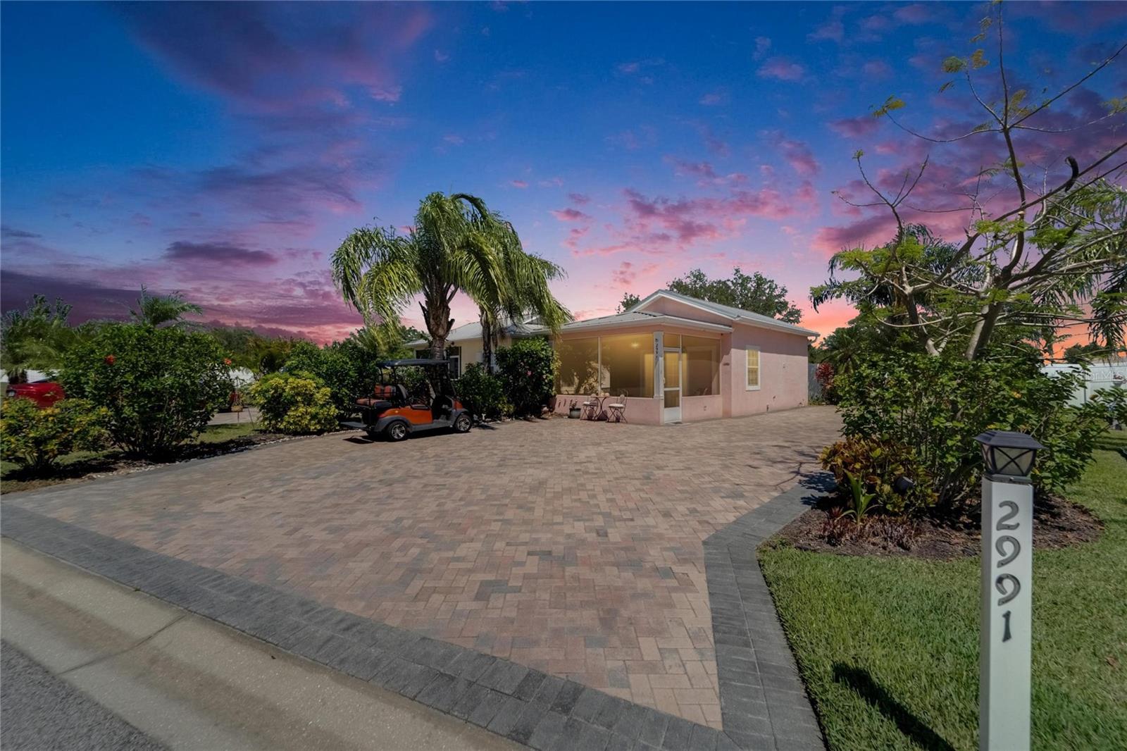 A First Class 55+ Community Welcoming Class A and Super C Motor Coaches. A beachy Casita with a large screened porch and paver pad located in gated Bay Lake Motorcoach Resort. Ideal for full-time living, snowbird or investment/rental. It's an easy stroll to the resort's beautiful clubhouse which features a pool, spa, exercise room, card/game room, banquet room, kitchen, craft and theater rooms. This CASITA feels welcoming the moment you enter the large screened porch with TV. Enter through the slider to an open living area and kitchen with center island and bar chairs for dining, and entertaining. All stainless steel appliances including French door refrigerator, flat top stove, built in microwave and dishwasher. Then enter the nice sized bedroom and full bathroom, large tub with shower. Good sized closet with stacked washer dryer combo unit and plenty of storage. Moving outside to the large paved patio areas and driveway to park your Class A or Super C motorcoach. RV/Marine pedestal with a night light that has 50 Amp, 30 Amp, 15 Amp and water connection next to a sewer connection. Comes with your own golf cart recently serviced and ready for you to cruise the neighborhood! This property is the perfect place to entertain all your new friends you’ll have and relax with your favorite adult beverages. Don't miss the resort's unique boat dock for private use with a boat launch which provides access into Lake Mattie! Park your MOTORCOACH and relax in luxury. Conveniently located between Tampa and Orlando. Only 22 miles to Disney and close to all Orlando attractions, airports and surrounding cities, plus golf, restaurants and shopping.