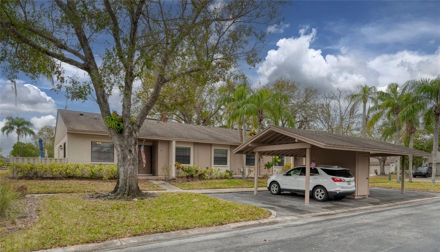 One or more photo(s) has been virtually staged. PRICED TO SELL – Move-In Ready Villa with Extensive 2024-2025 Updates!
Don't miss this exceptional opportunity! Bring your golf clubs and settle into this beautifully updated, immaculately maintained 4-bedroom, 2-bathroom villa that's truly turnkey. With NEW epoxy flooring on the patio and screened porch, NEW blinds in the primary bedroom, and FRESH paint throughout, this home is move-in ready from day one.
Major Updates for Peace of Mind: This villa stands out with significant recent investments including a brand-new AC unit (2024), a new roof (Feb. 2025), and an updated electric panel. The kitchen shines with stainless steel appliances: convection stove (2022), newer refrigerator and dishwasher, plus microwave and disposal installed in 2024. Custom cabinets and beautiful countertops complete this entertainer's dream kitchen that flows seamlessly into the dining area.
Comfortable Living Spaces: Light floods through large windows showcasing lush greenery and mature landscaping. Newer carpet cushions the four spacious bedrooms, while elegant tile graces the main living areas with updated lighting throughout. The generous primary bedroom offers a serene retreat with natural light and peaceful views.
Florida Living at Its Best: Step through sliding glass doors into your massive screened Florida room with brand-new epoxy flooring – perfect for morning coffee or sunset cocktails. The covered carport and freshly maintained exterior welcome you home, while the private setting provides tranquil neighborhood living.
Incredible HOA Value: Your monthly fees include exterior maintenance and painting, roof, lawn care, streets, cable, Sentricon pest control, irrigation, and trash. The assessment is fully paid for this year – one less thing to worry about!
Unbeatable Location: Minutes to shopping, dining, groceries, banks, Oldsmar Sports Complex, movie theaters, and world-class beaches. This pet-friendly community offers the perfect Florida lifestyle.
This villa won't last at this price – schedule your showing today!