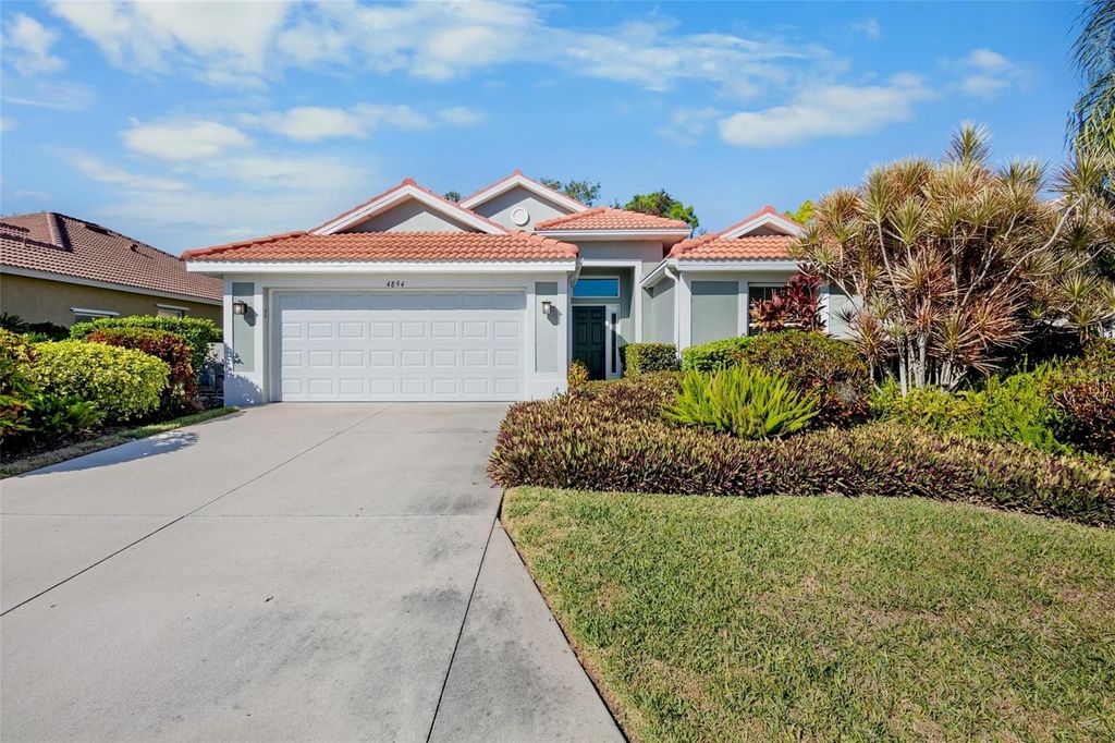 Photo of 4894 Sabal Lake Circle, Sarasota, FL 34238 (MLS # A4676972)