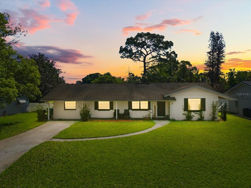 Welcome to this charming home situated on a spacious lot in a quiet, established neighborhood in Winter Park. From the moment you arrive, you’ll appreciate the inviting curb appeal, expansive front yard, and peaceful setting that make this property feel like home.
Inside, the home offers a light and open layout with a seamless flow between the living, dining, and kitchen spaces—perfect for both everyday living and entertaining. The updated kitchen features modern cabinetry, granite countertops, stainless steel appliances, and a functional layout with bar seating, making it both stylish and practical.  The bedrooms are comfortably sized with great natural light, offering flexibility for family, guests, or a home office. The bathrooms have been thoughtfully updated, including a beautifully renovated shower with modern tilework that adds a fresh, clean feel.  The Florida room in the back creates a relaxing space for drinking coffee or curling up for a family movie night.  Step outside to a generously sized backyard with endless potential—whether you envision creating an outdoor entertaining space, adding a pool, or simply enjoying the open green space. With plenty of room to spread out, this yard offers the kind of flexibility that’s hard to find.  Conveniently located near local shopping, dining, and major roadways, this home offers both comfort and accessibility. Zoned for great Winter Park schools.  Whether you’re a first-time buyer, investor, or looking to downsize, this property presents an incredible opportunity to own a home with room to make it your own.