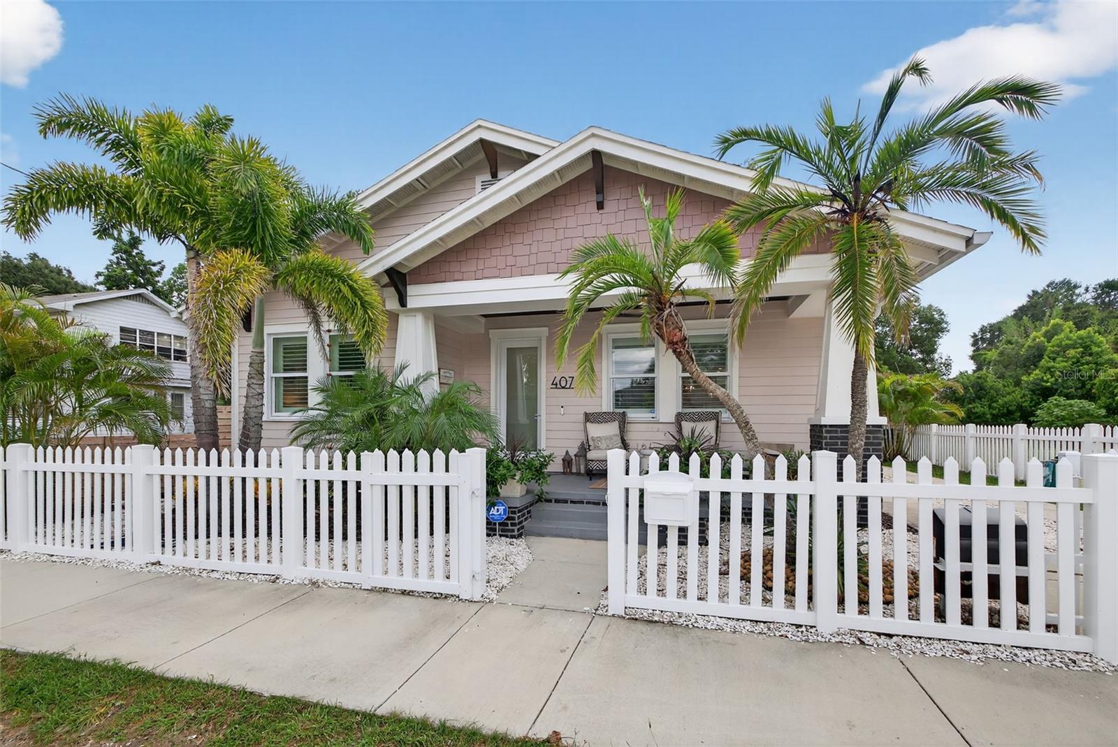 Rarely available new construction single-family home for RENT in Tampa! Discover the perfect blend of historic charm and modern living in this stunning 2023 built 3 bedroom, 2.5 bath home in the heart of Tampa Heights. Just steps from Tampa’s best coffee shops, restaurants, and charming shops, this residence offers an ideal balance of character, comfort, and convenience. From the inviting front porch to the fully fenced front and back yard with secured parking for 2–3 vehicles, every detail has been thoughtfully designed. The backyard is a true retreat with a hot tub, putting green, and expansive patio—perfect for entertaining or unwinding in style. Inside, an open floor plan with 9-foot ceilings, recessed lighting, and designer fixtures highlights the home’s bright and airy feel. The chef’s kitchen features Frigidaire Gallery stainless steel appliances, quartz countertops, breakfast bar seating, and custom cabinetry accented by rich woodwork. A half bath off the dining area offers ease for guests and entertaining. Oversized windows with plantation shutters flood the space with natural light, enhancing the timeless architecture and modern finishes. The owner’s suite offers abundant closet space with two walk-in closets, a spa-inspired bath with dual vanities, built-in makeup station, and sleek walk-in shower. Secondary bedrooms are tucked in the front of the home with a Jack-and-Jill bath. An expansive mudroom with built-in bench, laundry, and storage space provides convenient access to your secured parking area. This home is as practical as it is beautiful, perfect for relaxing or hosting. Centrally located, you’ll enjoy quick access to Downtown Tampa, Armature Works, Riverwalk, and the city’s best dining and entertainment.
Lease Terms: Available for annual lease.