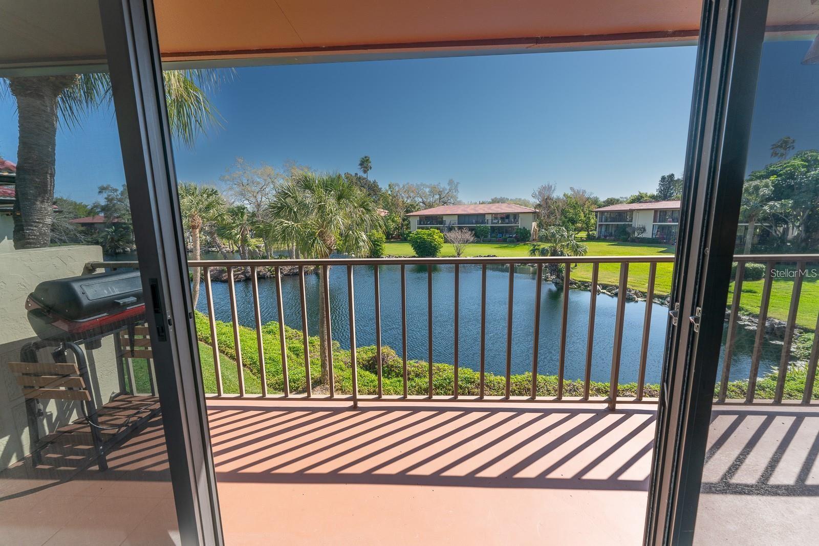 WILD OAK BAY welcomes you home to an ANNUAL - TURNKEY FULLY FURNISHED CONDO. NEW to the rental market as an annual rental is this beautiful second floor condo overlooking the large pond. This condo features 3 bedrooms, 2 bathrooms, large Florida room with dinette, an open floor plan, living room and separate dining area. The family room, Florida room, kitchen and Master bedroom all have views of the large pond and beautiful landscaping. The kitchen is well equipped with everything you need to make your stay enjoyable including an eat in breakfast bar. Once you arrive at Wild Oak Bay you will think you are in paradise, the entire community is spectacularly landscaped and tropical in nature. Enjoy a day at the beach then relax by the pool and spa when you get back to your unit. Conveniently located off of El Conquistador Parkway and within minuets to IMG Academy, golfing, shopping, fine dining and so much more. This condo is absolutely beautiful and is available as an annual rental or seasonal rental. Perfect for the IMG family or relocating to the area. Wild Oak Bay is conveniently located near golfing, fine dining, shopping and so much more. Contact us for all the details you will not be disappointed.