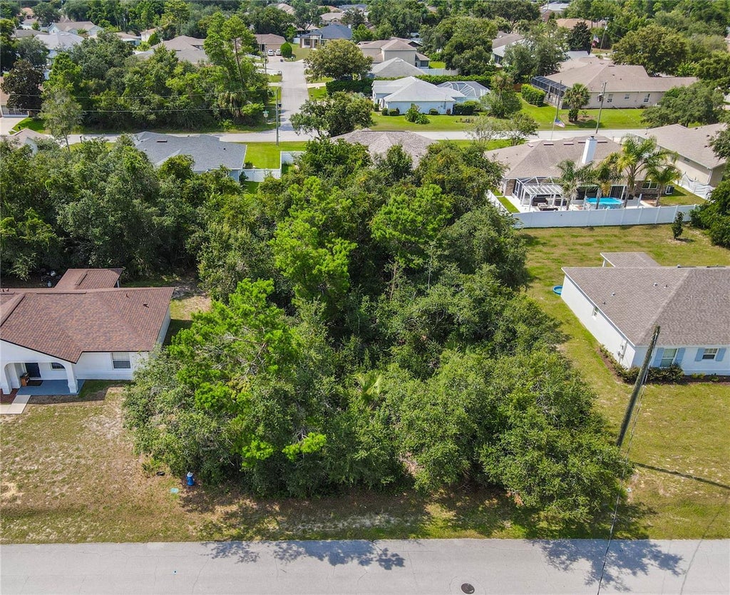 Photo of 76 Freeport Lane, Palm Coast, FL 32137 (MLS # FC320323)