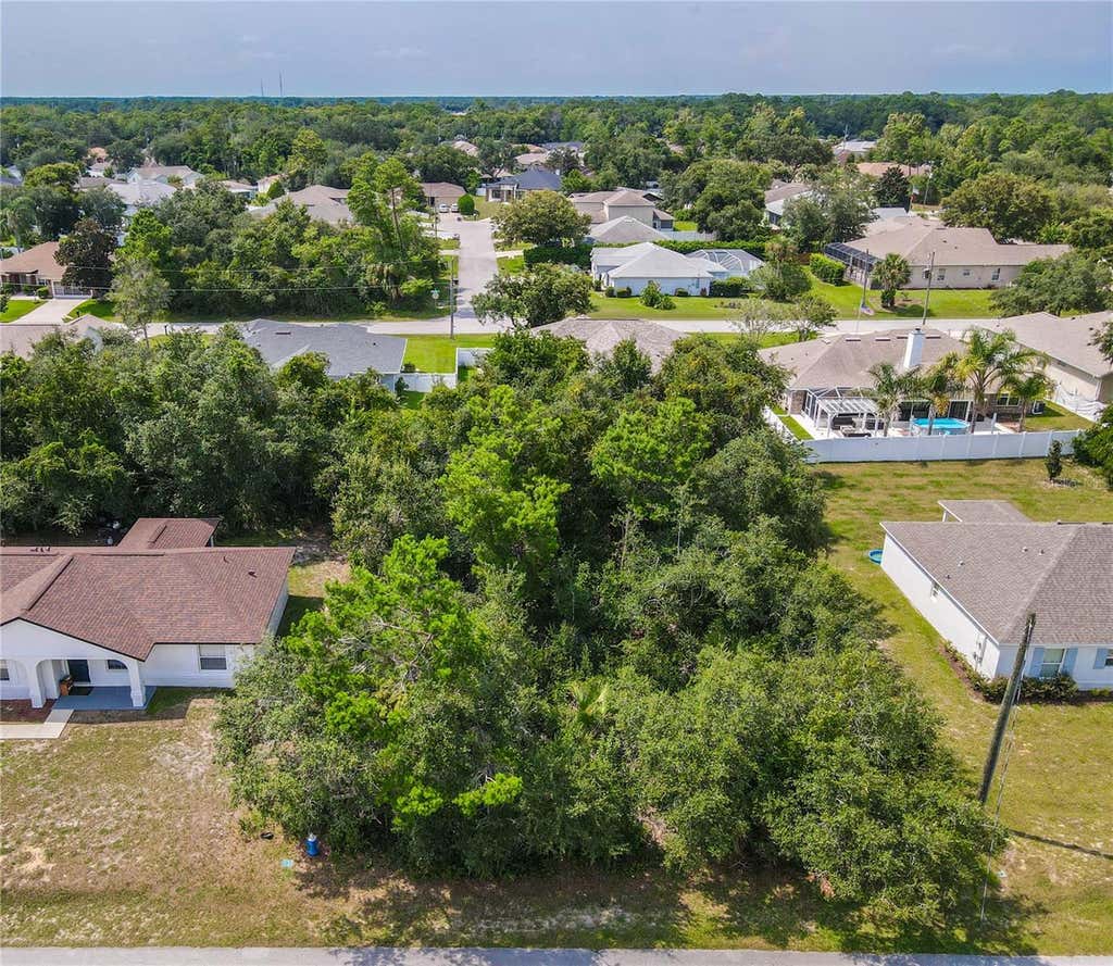 Photo of 76 Freeport Lane, Palm Coast, FL 32137 (MLS # FC320323)
