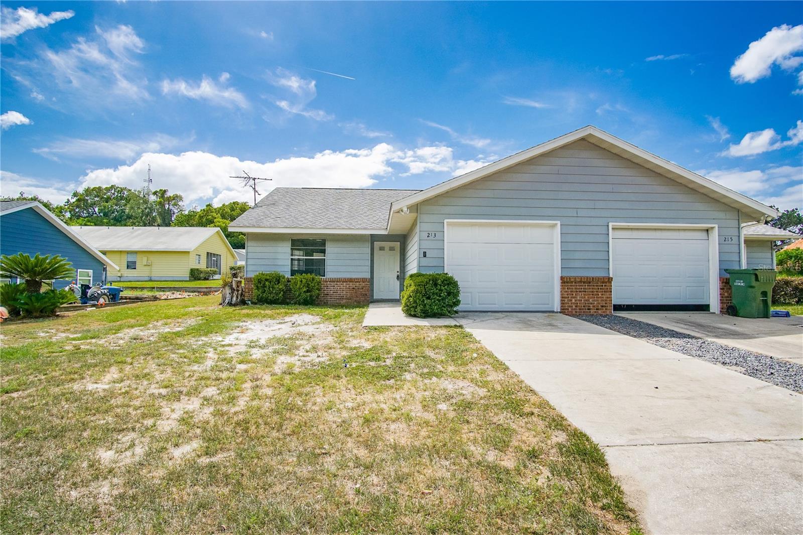 Move-in Ready, Beautifully Remodeled Half-Duplex with Newer Roof and AC! Discover this stunning 2-bedroom, 2-bath attached single-family home (half-duplex) featuring a roof less than 10 years old and a 2022 AC for worry-free living. Fully remodeled in 2022, the interior impresses with an open-concept layout, modern finishes, updated flooring throughout, and a stylish kitchen perfect for entertaining. Both bathrooms have been tastefully updated to reflect contemporary design and comfort. Enjoy the convenience of a private one-car garage with washer/dryer hookups. Ideally located on a quiet, well-kept street near Highway 441 and UF Health Leesburg Hospital. This turnkey home is perfect for first-time buyers, downsizers, or investors seeking a move-in-ready property with excellent rental potential. Don’t miss your chance—schedule a showing today!