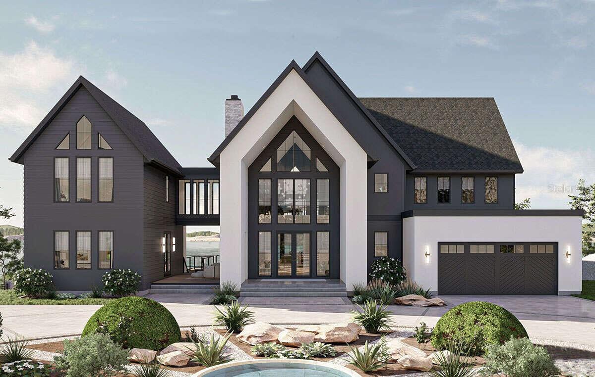Under contract-accepting backup offers. Pre-Construction. To be built. Pre-Construction. To be built. Beautiful 4 bedroom, 4 full bathrooms, 2 1/2 baths, Modern Contemporary home on 1/2 acre. Light and bright with all the windows to let natural light flow in. Enter the home through double door entry. Floating staircase. private office with separate entrance Two-Story Great room with fireplace is located in the center of the home off of the kitchen and dining areas. The first floor master suite off of the great room, offers glass sliding doors that lead to it's own private patio, a customized closet, and a private bathroom with dual vanities, a garden tub, and separate walk in shower with wall to ceiling tile and frameless shower door. The second floor you will find two additional bedrooms with their own bathrooms as well as a loft. Customizable layout, sq. ft, and finishes only until constructions starts. Fantastic location. The neighborhood backs up to Upper Tampa Bay trails. Minutes to Publix, Restaurants, expressway, the mall is only 1 1/2 miles away, 15 minutes to the Tampa Airport and 15-20 minutes to Riverwalk.