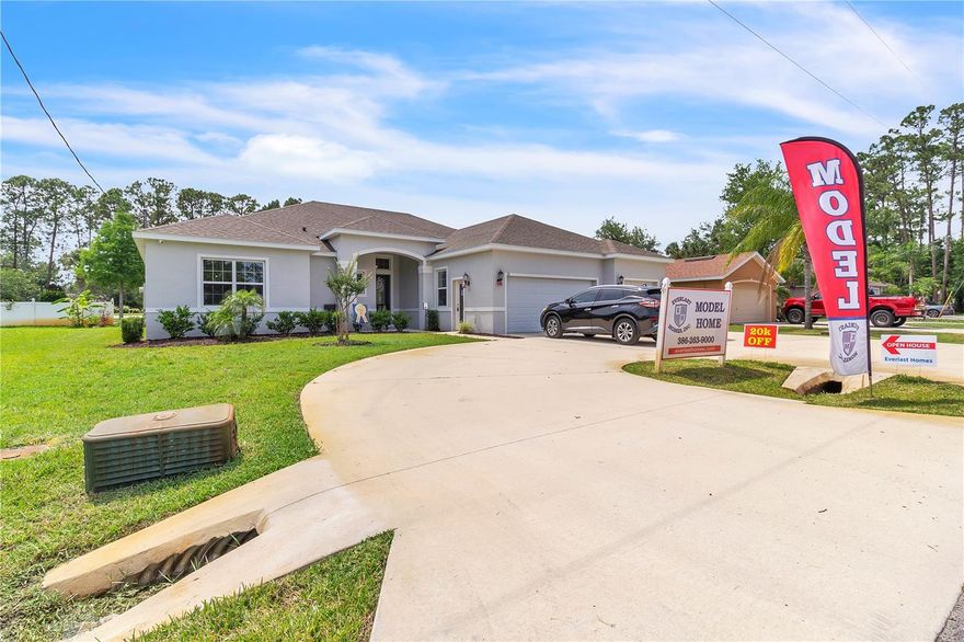 Everlast Homes offers this beautiful property for sale! This house is full of amenities, some of which are Travertine floors throughout all main living areas, Luxury Vinyl Floors in all bedrooms, Granite counter tops through out home, all wood cabinetry, stainless steel appliance package, irrigation system, alarm system, decorative glass in front door, coffered ceiling in great room, crown moldings in main living area and pri8mary bedroom plus many many more. Call ahead to see, 386-263-9000