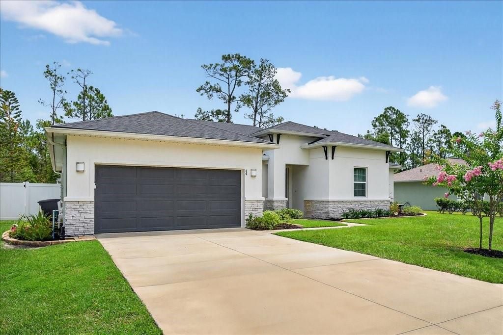 Photo of 44 Boulder Rock Drive, Palm Coast, FL 32137 (MLS # FC310967)