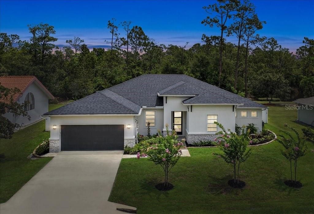 Photo of 44 Boulder Rock Drive, Palm Coast, FL 32137 (MLS # FC310967)