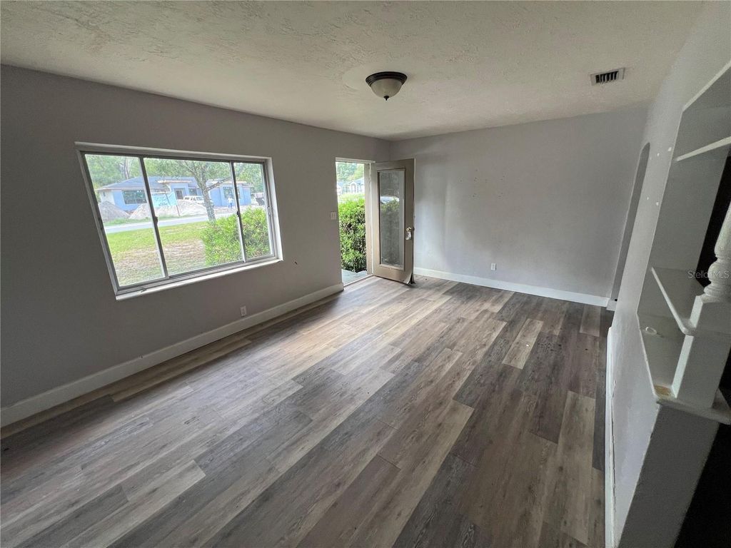 Photo of 240 Deerfoot Road, Deland, FL 32720 (MLS # O6353774)