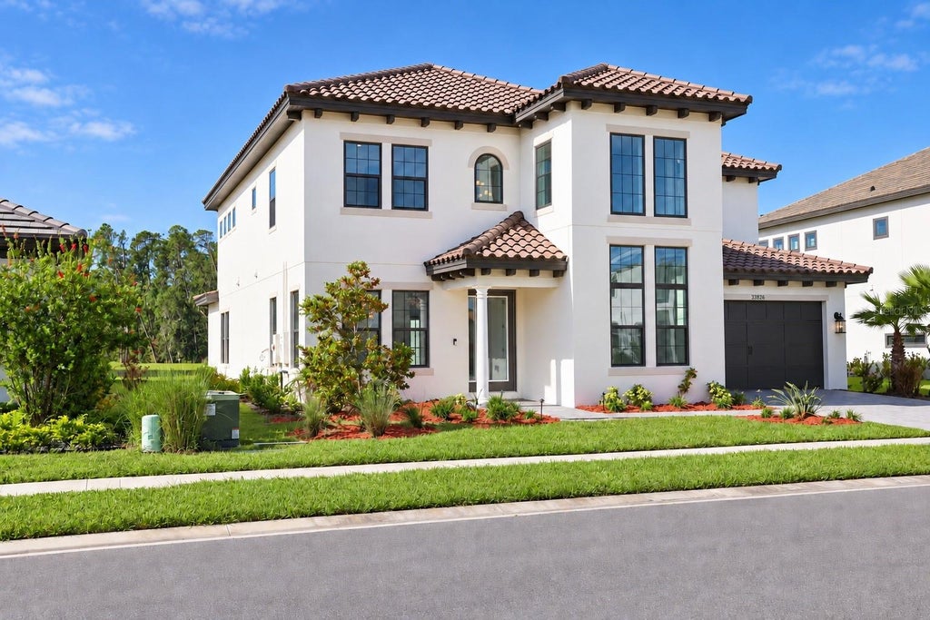 Photo of 33826 Ocean Spray Lane, Wesley Chapel, FL 33543 (MLS # O6451644)