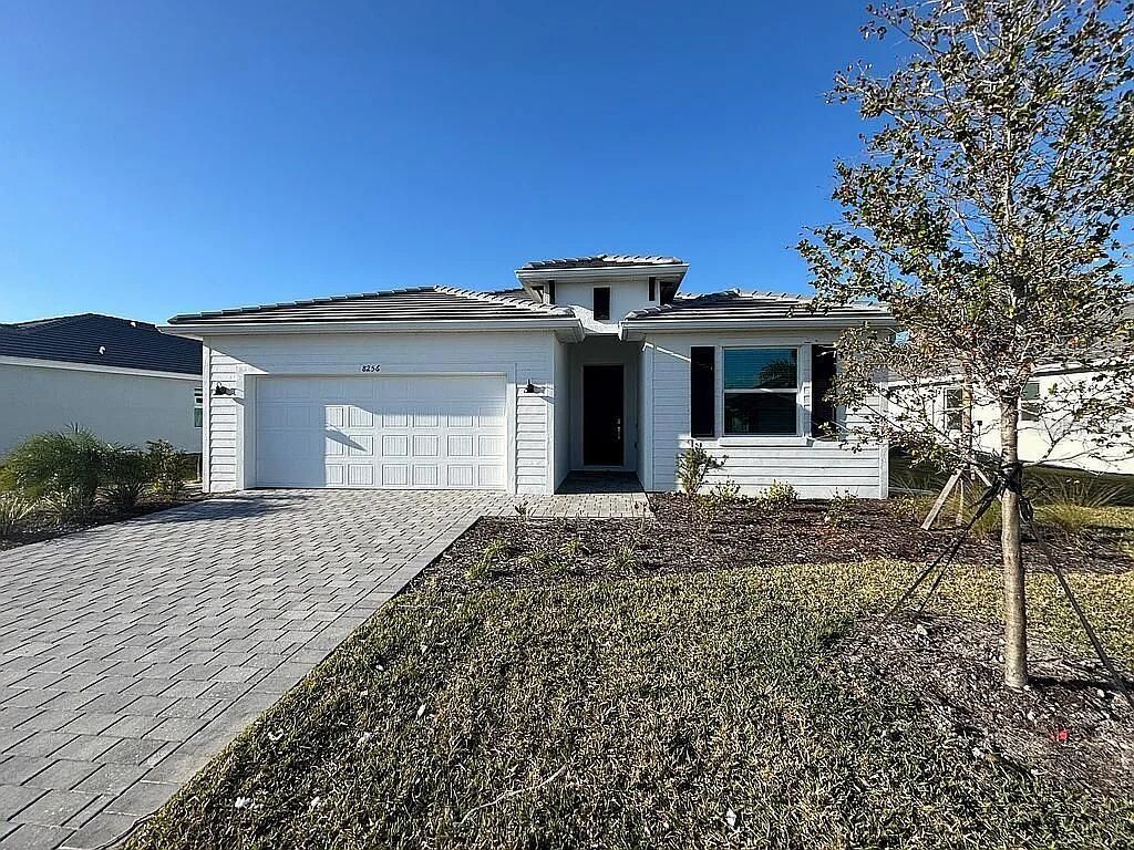 Photo of 8256 Shore Lake Drive, Englewood, FL 34224 (MLS # O6362639)