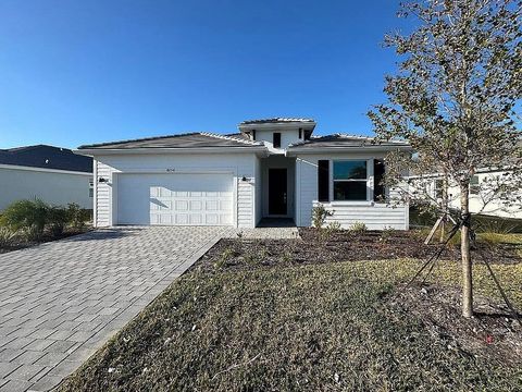 Photo of 8256 Shore Lake Drive, Englewood, FL 34224 (MLS # O6362639)