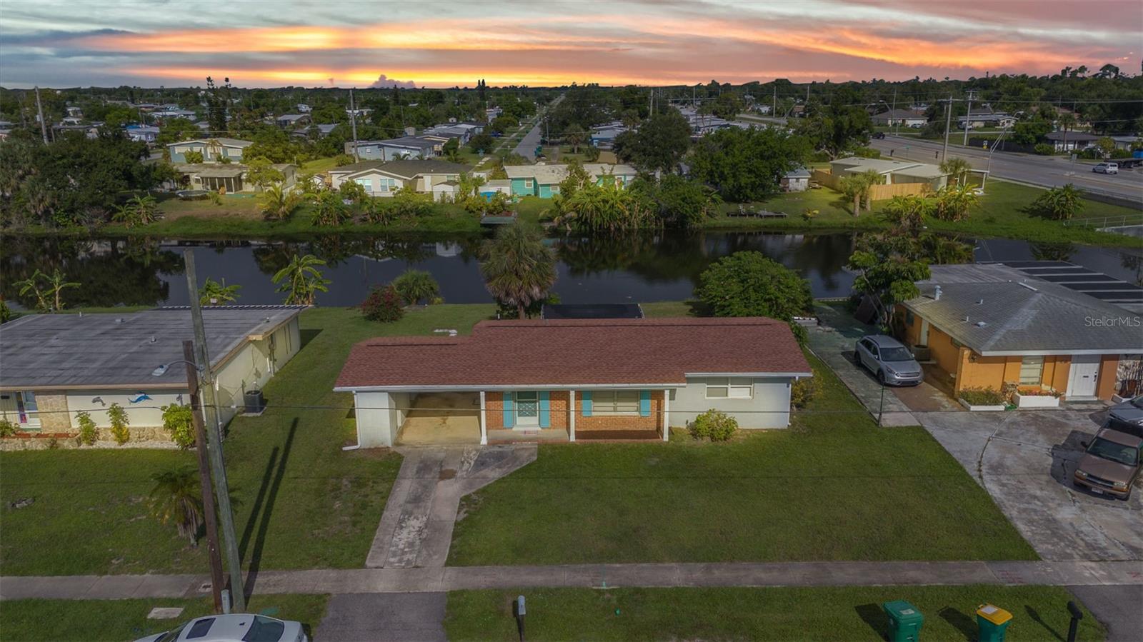 Welcome to 2153 Hariet St, a WATERFRONT concrete block home with two bedrooms, one bathroom, 880 square feet of living space and a carport located in Port Charlotte! Here you will find several recent updates including fresh paint, new fans, new blinds, and lots of other small touches that make this one of the best priced homes in Southwest Florida! This great home could be perfect for a first time home buyer, someone looking for a second home, vacation home, or even a rental property! Imagine relaxing while looking over the brackish water canal, throwing a fishing line to see what bites, or hopping in your own canoe/kayak and going for a peaceful stroll, all of this is possible right from your own backyard! This amazing home is also conveniently located near I75 for easy commuting and near US41 for all the great shops, dining, and entertainment Port Charlotte has to offer! Don’t forget to check out the 3D VIRTUAL TOUR and FLOORPLAN to see this great home right from the comfort of your current home, then call your favorite real estate agent to schedule a private showing!