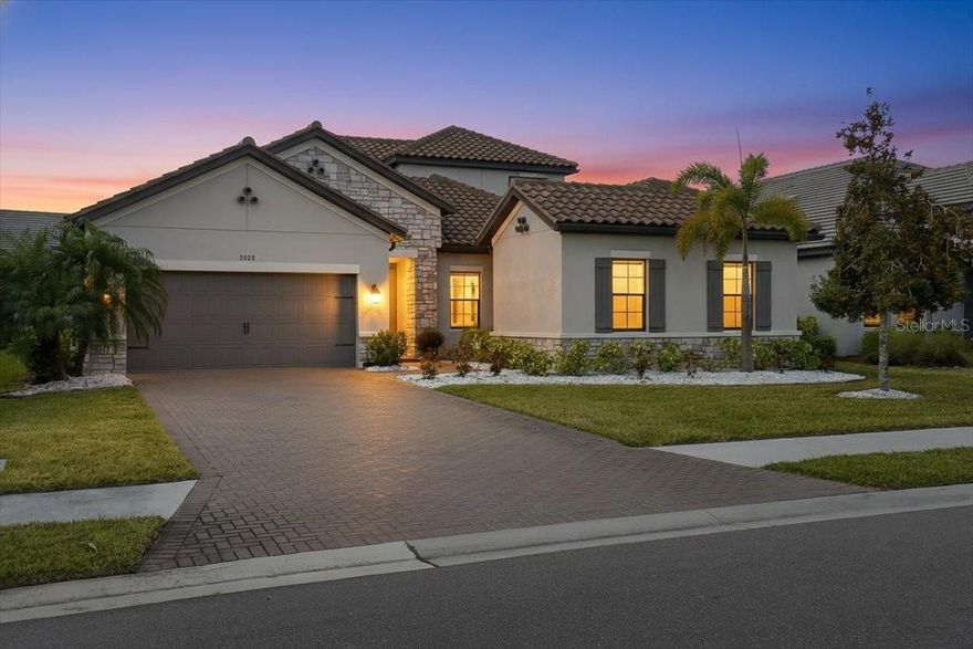 Incredible Lakewood Ranch pool home with a private attached in-law suite and extensive upgrades throughout.

Located in the gated community of Woodleaf Hammock, this spacious residence offers 4 bedrooms, 5 bathrooms, a first-floor office, and an upstairs loft ideal for a gym, playroom, or hobby space. The second level also features a full bath and generous storage.

The attached in-law suite includes its own exterior entrance, making it ideal for multigenerational living, long-term guests, or a private caretaker space. Complete with a living room, kitchenette, bedroom, and full bath with walk-in shower, it providing comfort and independence.

In the main home, the upgraded gourmet kitchen is designed for both everyday living and entertaining, featuring quartz countertops, a large center island, soft-close cabinetry, and a dedicated coffee bar area. The kitchen opens seamlessly to the spacious living room with tray ceiling and whole-home stereo system. Each bedroom includes its own bathroom, offering privacy and convenience for everyone.

Step outside to a true backyard retreat. The extended travertine lanai surrounds a heated saltwater pool and a fully equipped outdoor kitchen with cabinetry and gas hookup, perfect for year-round entertaining.

Additional features include a tile roof, brick paver driveway, full gutter system, two zoned HVAC systems, and no storm damage from recent hurricanes. Located in preferred Flood Zone X (no flood insurance required). This homes comes with the 10 year transferable structural warranty from builder.

Woodleaf Hammock residents enjoy a resort-style community pool, grill area, pickleball courts, dog park, and playground.

Lakewood Ranch has been the nation’s top-selling multigenerational master-planned community for eight consecutive years, offering A+ rated schools, dining, shopping, and entertainment, all just under 18 miles from the Gulf Coast beaches.