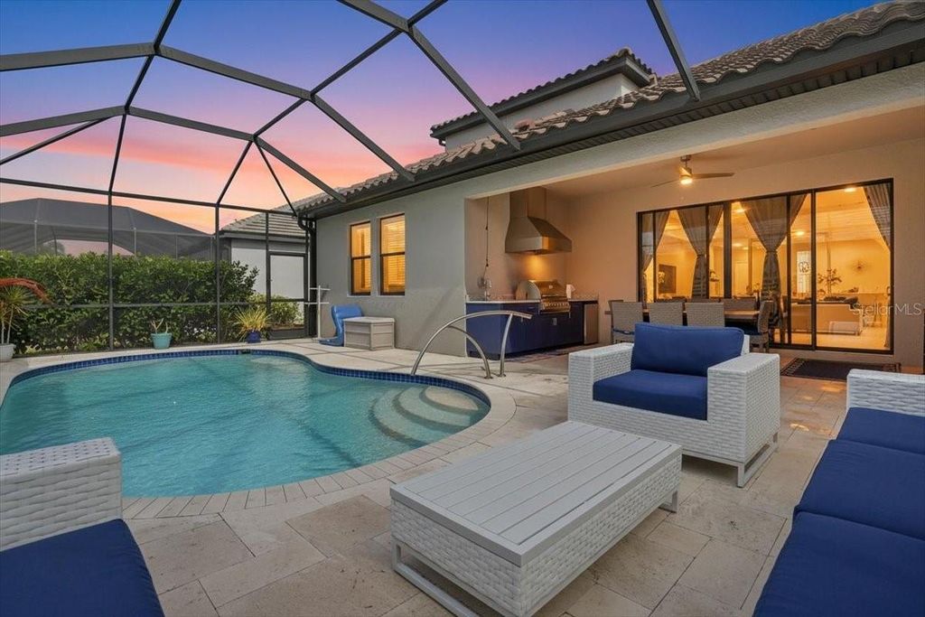 Photo of 2028 Woodleaf Hammock Court, Bradenton, FL 34211 (MLS # A4682385)