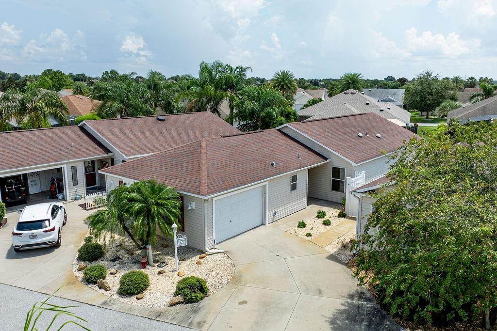 Beautifully updated 3/2 Courtyard Villa in the Village of Hemingway. No carpeting—wood-look flooring throughout. Kitchen with solid surface countertops and stainless steel appliances. Enclosed lanai with mini-split A/C for year-round comfort. The private courtyard with privacy wall is ideal for entertaining or a safe area for pets. Centrally located near Sumter Landing, Brownwood, and Colony Plaza offering shopping, dining, and entertainment. Move-in ready and perfectly designed for The Villages lifestyle!