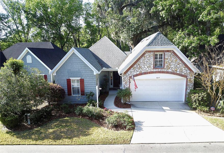 Welcome to your next chapter in the heart of NW Gainesville! Tucked away on a quiet street in the small, gated neighborhood of Kelston Lane, this cottage-style home is a perfect blend of comfort, charm, and everyday convenience. From the moment you arrive, you’ll notice the inviting feel of this home-it’s the kind of place that just feels right! Inside, you’re greeted with a bright and easy-flow layout that makes both relaxing and entertaining easy. The Great Room has a fireplace and opens to the Florida Room which really expands your living space and gives lots of natural light to the main living area of the home. The kitchen, recently updated, is ready for it all, with plenty of space to cook, gather, and make memories. The owner’s suite has a spacious custom walk-in closet and a large ensuite bathroom with a walk-in shower and double vanity. There is another bedroom, a full bathroom and an office downstairs, and then upstairs is a spacious bonus room that gives plenty of room for bedrooms, home office, flex space, work out room, you name it! The outside space is well-landscaped and low maintenance with the HOA taking care of the front and all green space which gives you a beautiful natural space to enjoy! The home also boasts an interior laundry room and a double car garage for plenty of storage. Location-wise, this is hard to beat - as you are just off of 43rd Street and 8th Avenue, close to shopping, dining, parks, easy commutes to hospitals, UF or Santa Fe campuses and everything else Gainesville has to offer, while still enjoying the calm of an established, quaint neighborhood. Whether you’re starting fresh, downsizing, or simply looking for a place that feels like home the moment you walk in, this one checks all the boxes. Call to schedule your showing today! This one won’t last!