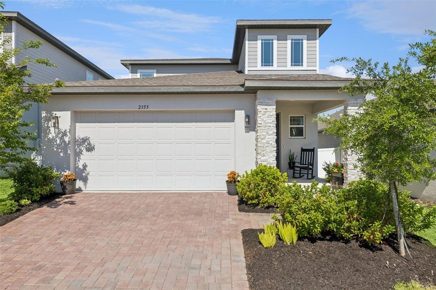 Beautifully upgraded home in the heart of Minneola! This stunning property features an open floor plan perfect for modern living and entertaining. The kitchen showcases elegant quartz countertops, a stylish backsplash, and stainless steel appliances, all flowing seamlessly into the main living areas to create a bright and inviting space.

The homeowner has thoughtfully enhanced this home with premium upgrades, including a professionally finished garage and patio with a durable, high-end coating that goes beyond standard epoxy. Additional features include custom shelving in the laundry room and primary closet for optimal organization, a smart washer and dryer, and a whole-home water filtration system for added comfort and convenience.

This home is also equipped with modern smart and security features, including a Kwikset keypad smart lock on the front door and a pre-wired security system for added peace of mind.

Step outside to enjoy a fully privacy-fenced backyard, perfect for relaxing or entertaining.

Located in a desirable community offering resort-style amenities including a pool, fitness center, basketball courts, tennis courts, and clubhouse.

This home truly shows pride of ownership and is move-in ready!