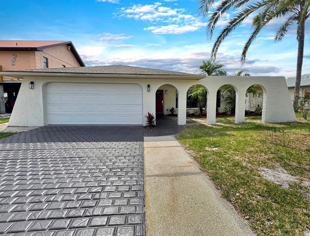 Photo of 9907 Island Harbor Drive, Port Richey, FL 34668 (MLS # TB8386324)
