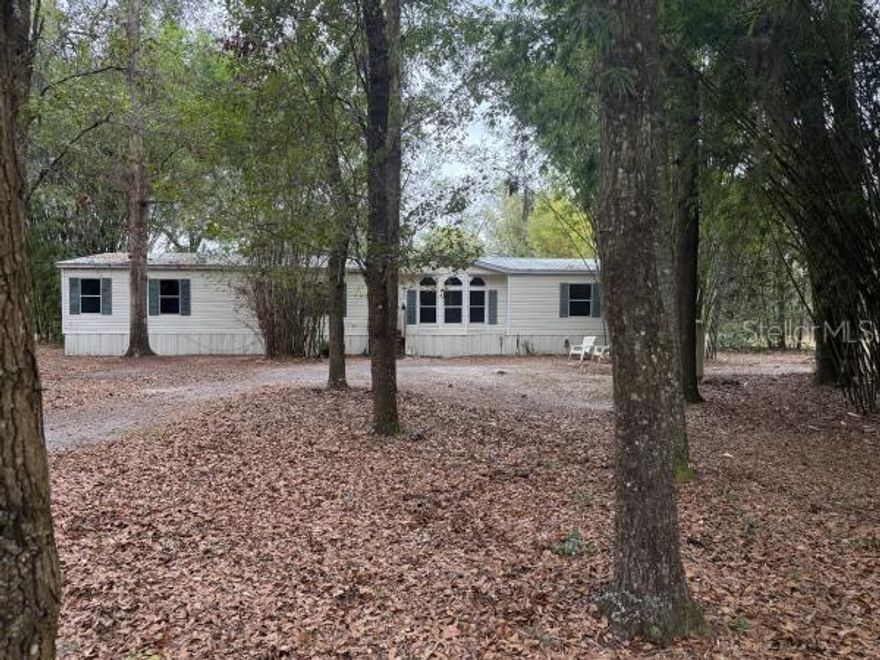 Auction Property. THIS PROPERTY IS BEING SOLD AT ON-LINE AUCTION, WITH A RESERVE, MINIMUM BEING THE AMOUNT OWED, APPROXIMATELY $50,000.00. This 3BR, 2.5 BA Doublewide sits on an half acre parcel, giving you room to do more. This home is worth so MUCH MORE, and NOW IS THE TIME TO GET A GREAT BUY, YOU NEED TO BID NOW!  BIDDING ENDS SUNDAY FEB. 1st at 3:00pm. The Home is located convenient to Gainesville in the little town of LaCrosse, with great access to Home Depot, Super Wal-Mart, restaurants, gas, grocery stores, and more. You need to register now, as bidding has already started and ENDS ON SUNDAY FEB. 1st 1, 2026 at 3:00pm.  DON'T MISS THIS ONCE IN A LIFETIME OPPORTUNITY, WHERE YOU GET TO SET THE PRICE!